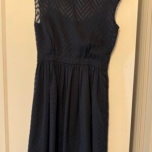 Stylish Black Sleeveless Dress with chevron pattern